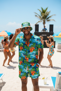 Man wearing complete Island Escape Bundle at beach party
