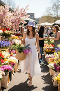 Woman wearing Spring Bloom bucket hat at flower market