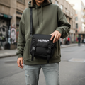 Yurap Designs crossbody bag small messenger bag worn across body in urban setting