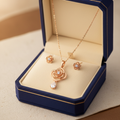 Rose gold jewelry set with earrings and necklace in gift box